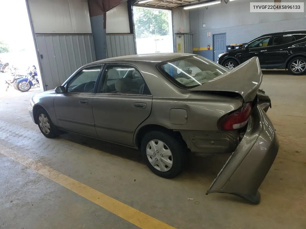 1999 Mazda 626 Es VIN: 1YVGF22C4X5896133 Lot: 61879055