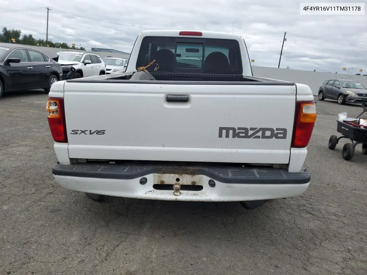 2001 Mazda B3000 Cab Plus VIN: 4F4YR16V11TM31178 Lot: 58777155