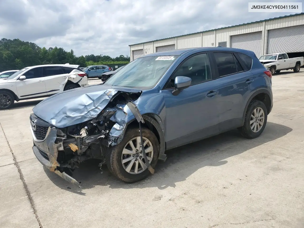 2014 Mazda Cx-5 Touring VIN: JM3KE4CY9E0411561 Lot: 56130535