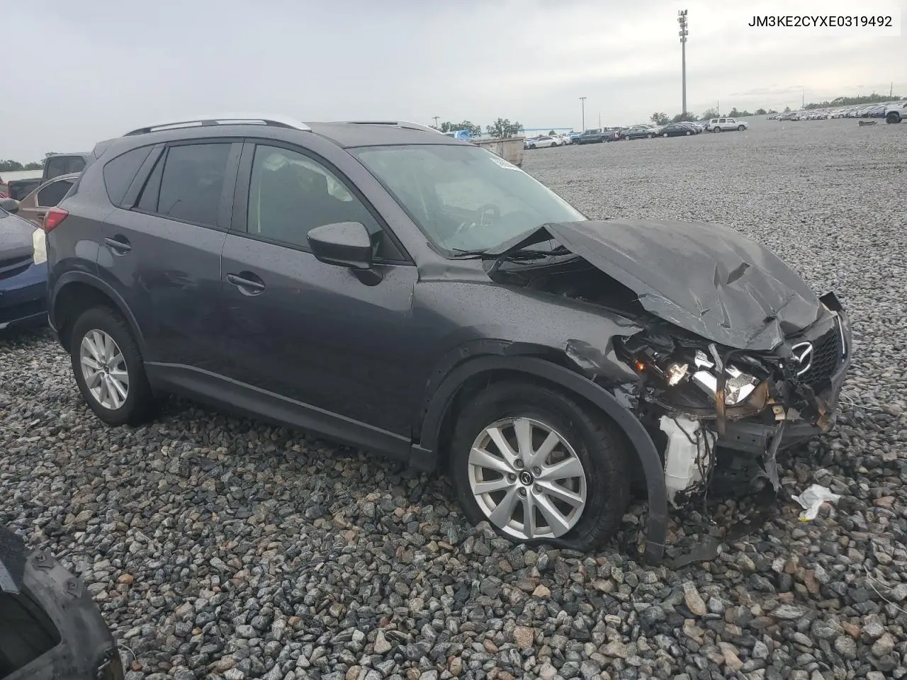 2014 Mazda Cx-5 Touring VIN: JM3KE2CYXE0319492 Lot: 56604445