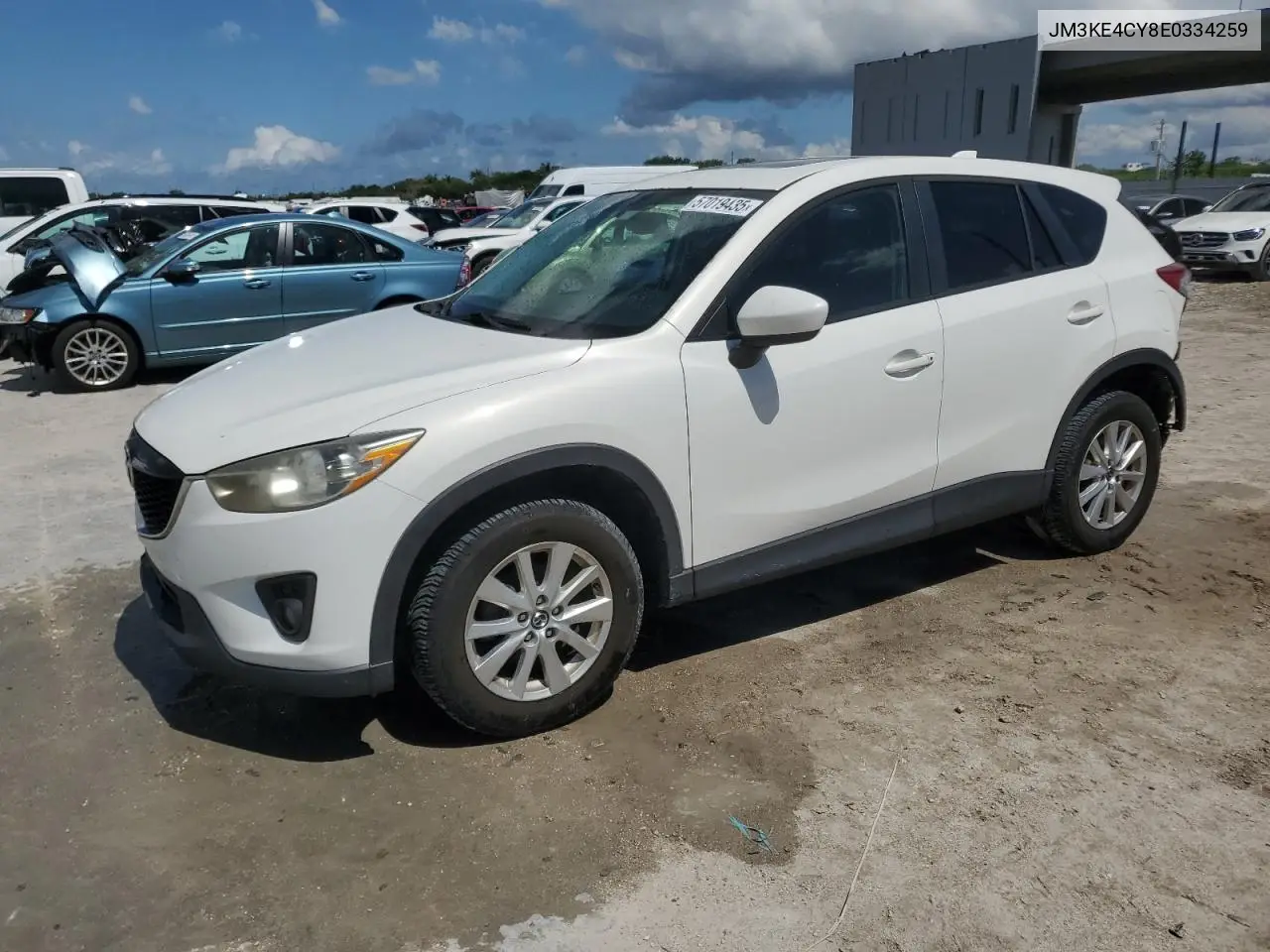 2014 Mazda Cx-5 Touring VIN: JM3KE4CY8E0334259 Lot: 57019435