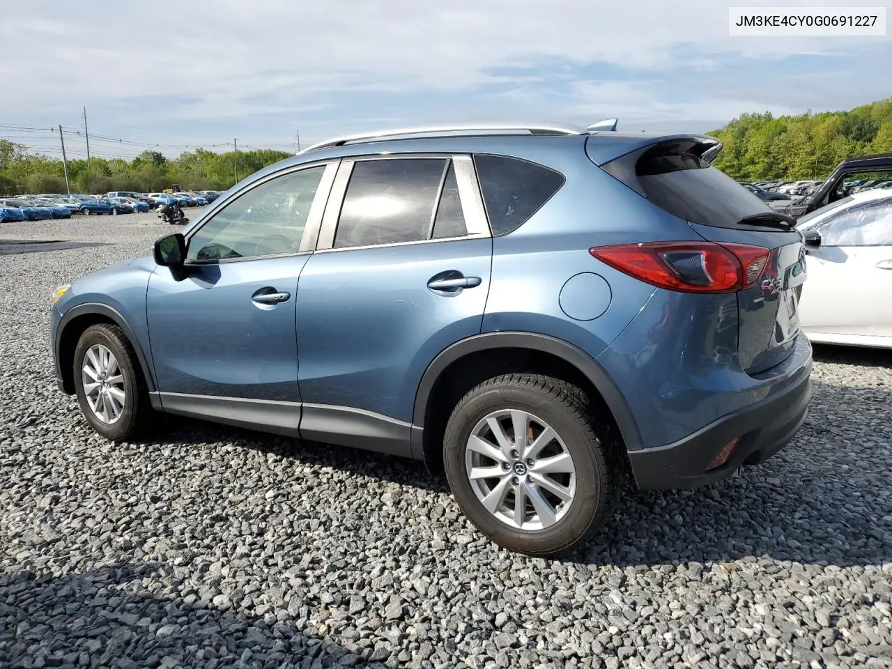 2016 Mazda Cx-5 Touring VIN: JM3KE4CY0G0691227 Lot: 56330165