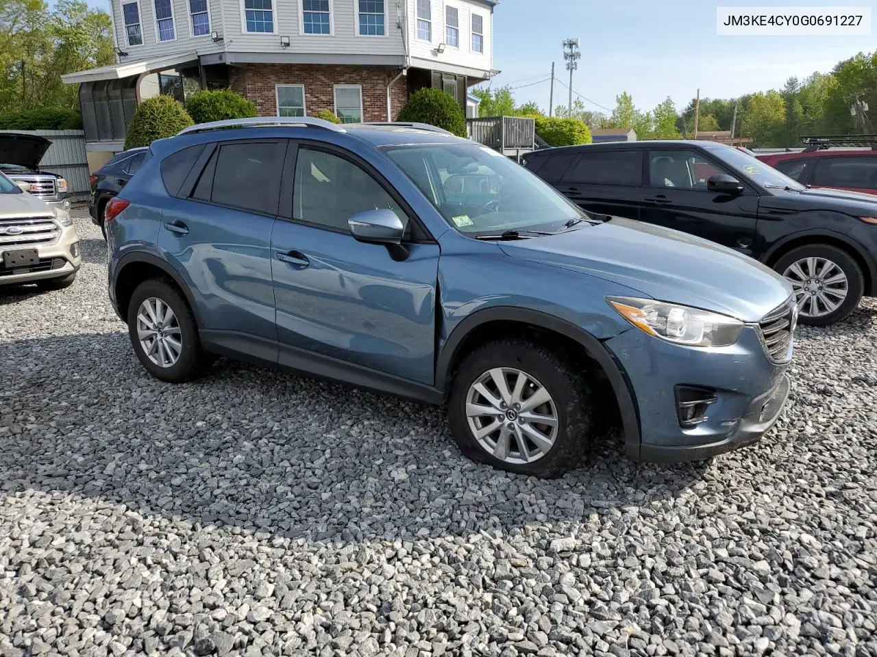 2016 Mazda Cx-5 Touring VIN: JM3KE4CY0G0691227 Lot: 56330165