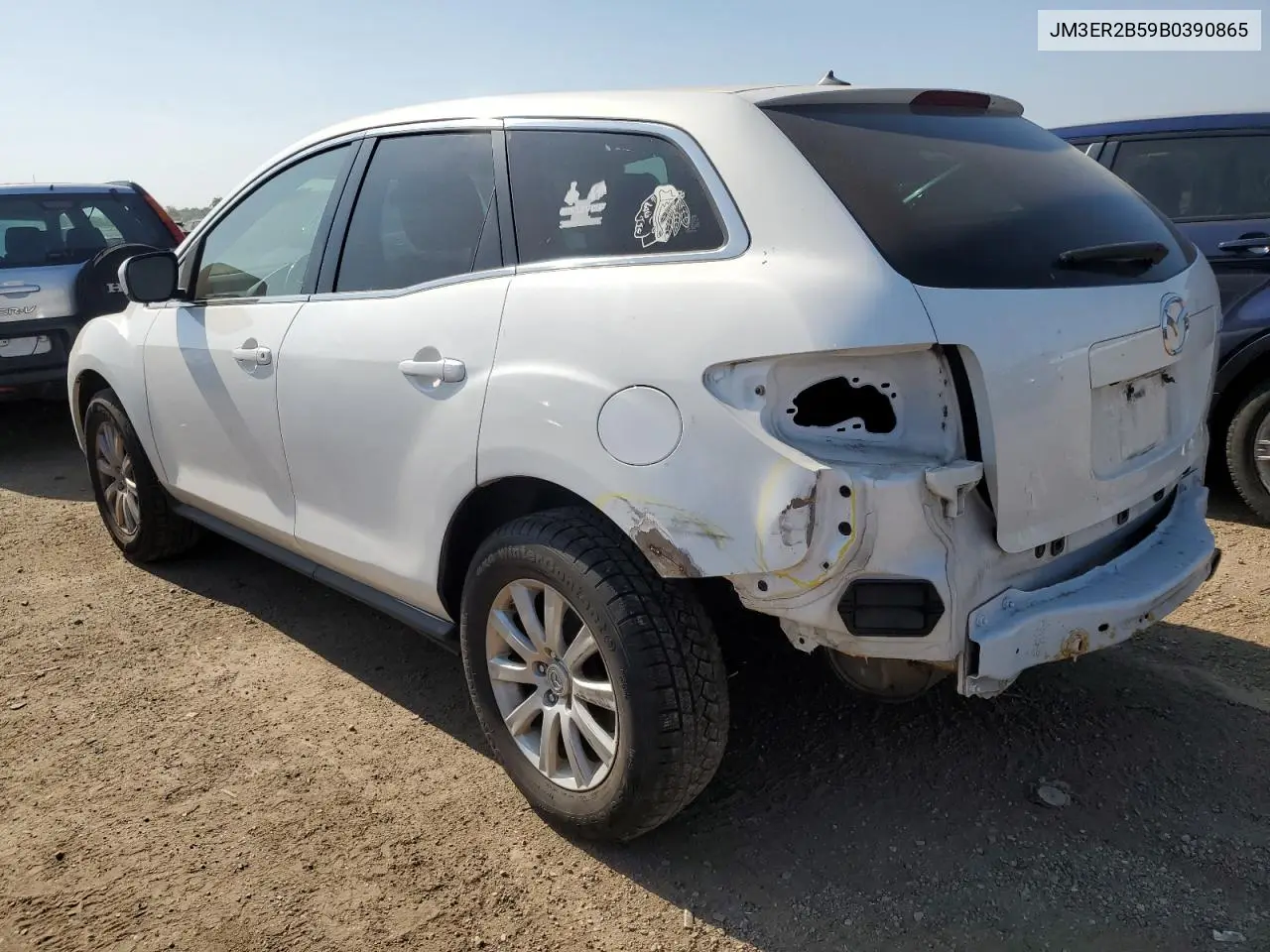 2011 Mazda Cx-7 VIN: JM3ER2B59B0390865 Lot: 61001025