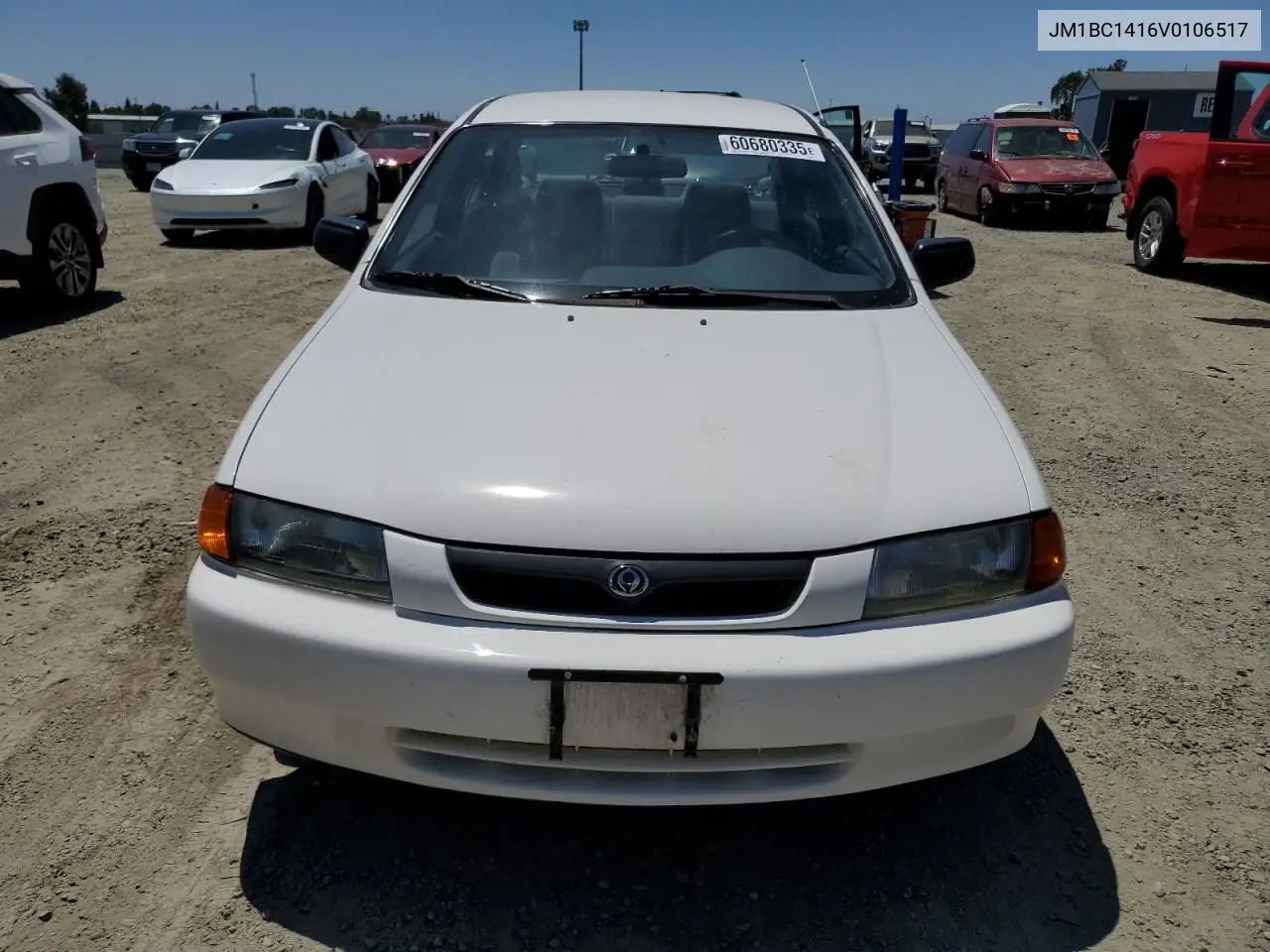 1997 Mazda Protege Dx VIN: JM1BC1416V0106517 Lot: 60680335