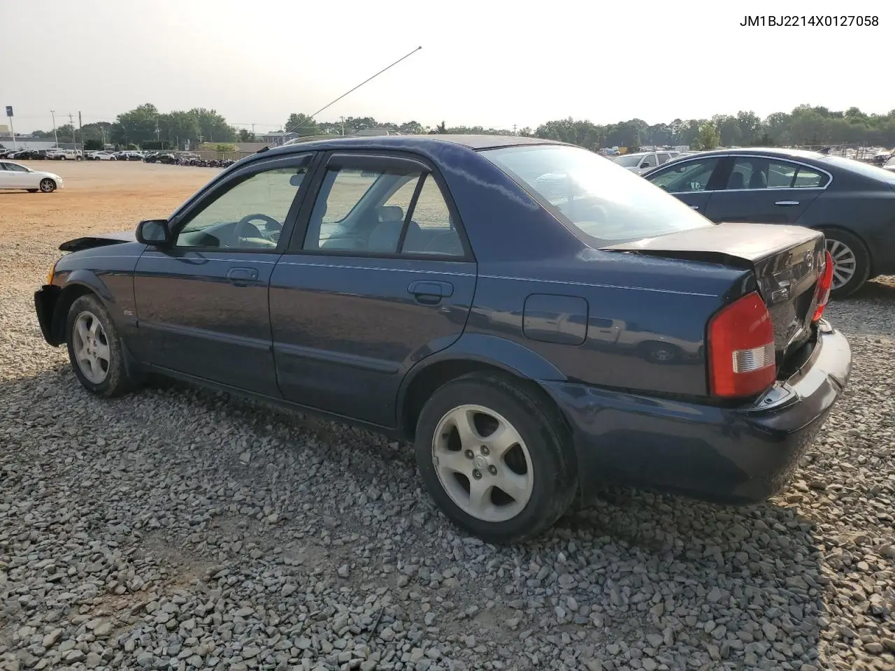 1999 Mazda Protege Es VIN: JM1BJ2214X0127058 Lot: 59047365