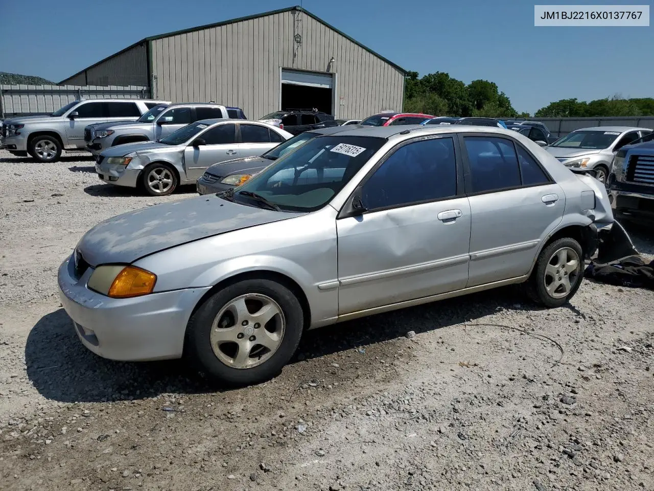 1999 Mazda Protege Es VIN: JM1BJ2216X0137767 Lot: 59116315