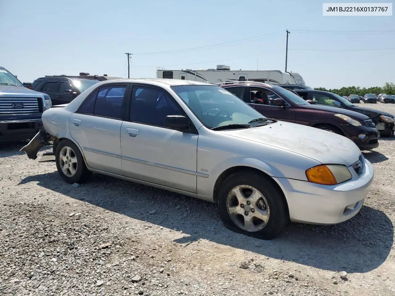 1999 Mazda Protege Es VIN: JM1BJ2216X0137767 Lot: 59116315