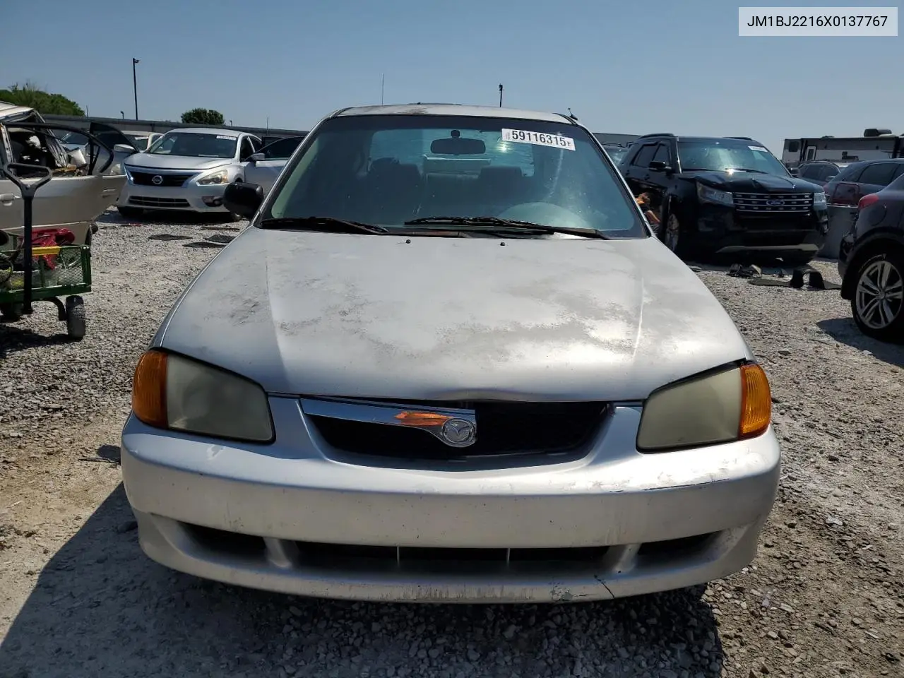 1999 Mazda Protege Es VIN: JM1BJ2216X0137767 Lot: 59116315