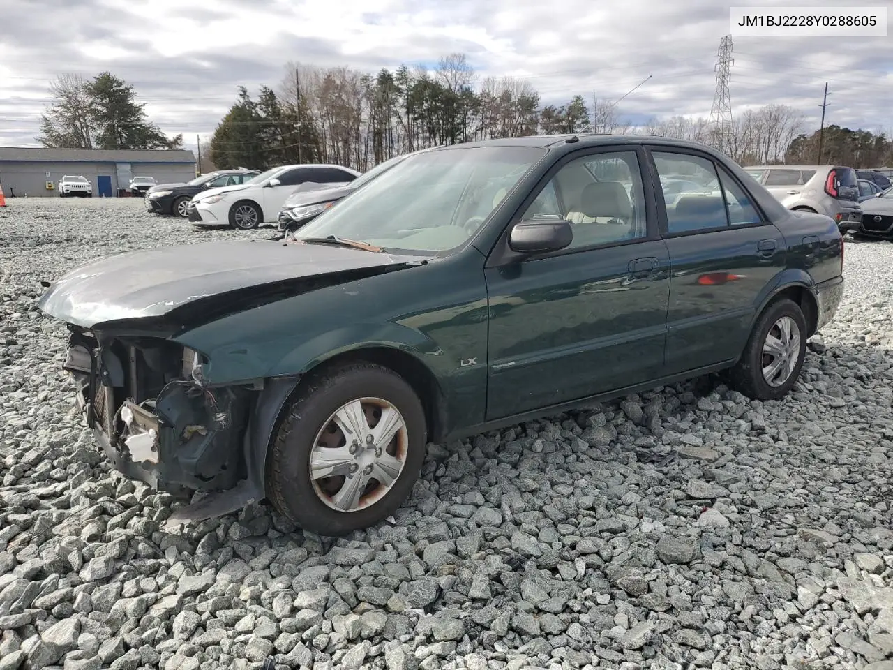 2000 Mazda Protege Dx VIN: JM1BJ2228Y0288605 Lot: 47955035