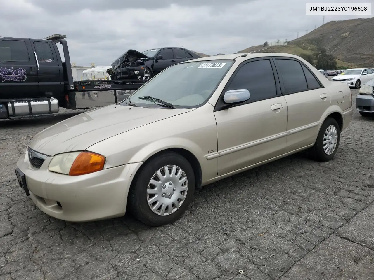 2000 Mazda Protege Dx VIN: JM1BJ2223Y0196608 Lot: 55479625