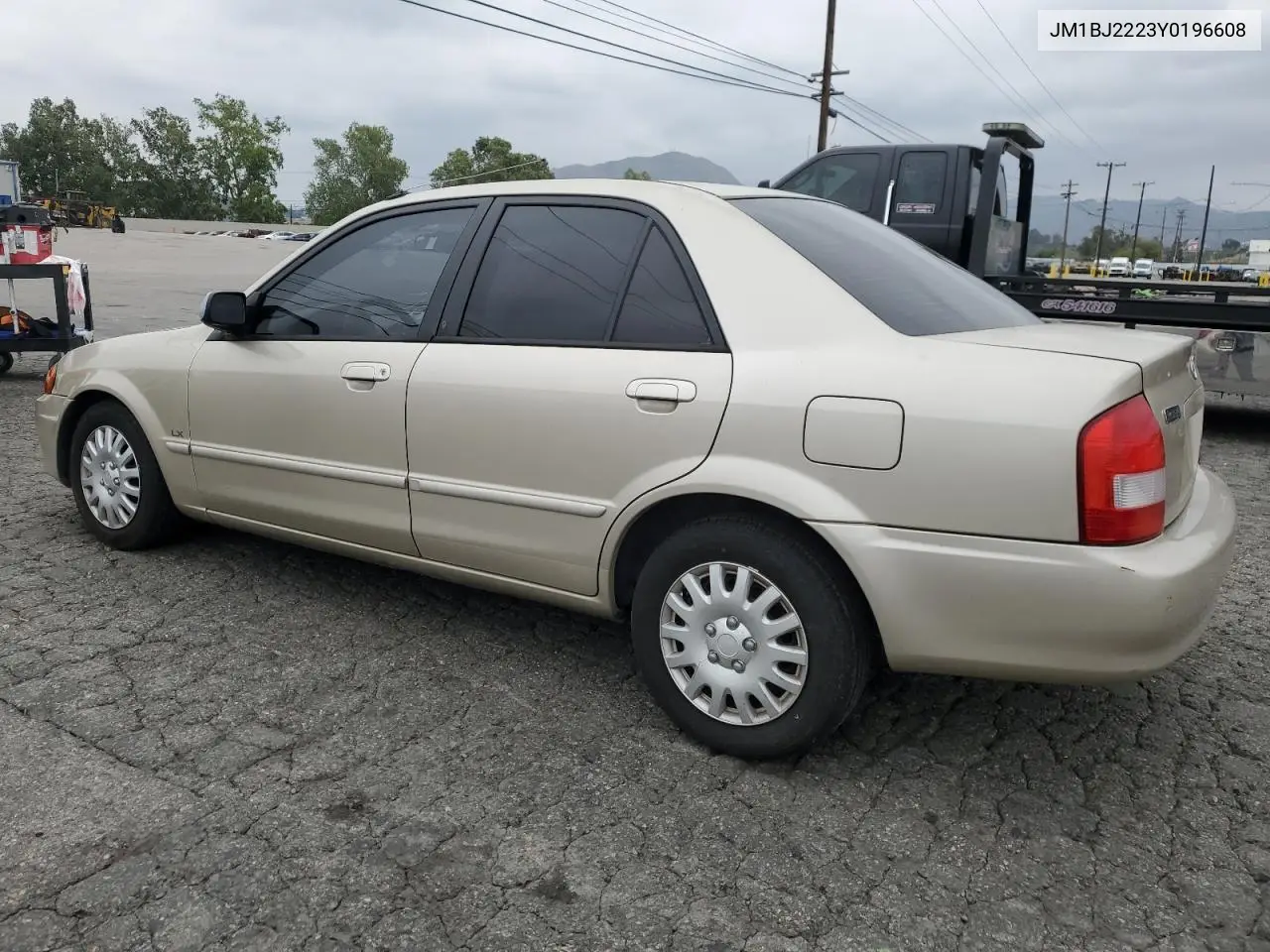 2000 Mazda Protege Dx VIN: JM1BJ2223Y0196608 Lot: 55479625