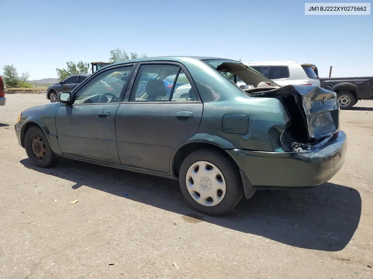 2000 Mazda Protege Dx VIN: JM1BJ222XY0275662 Lot: 57160195
