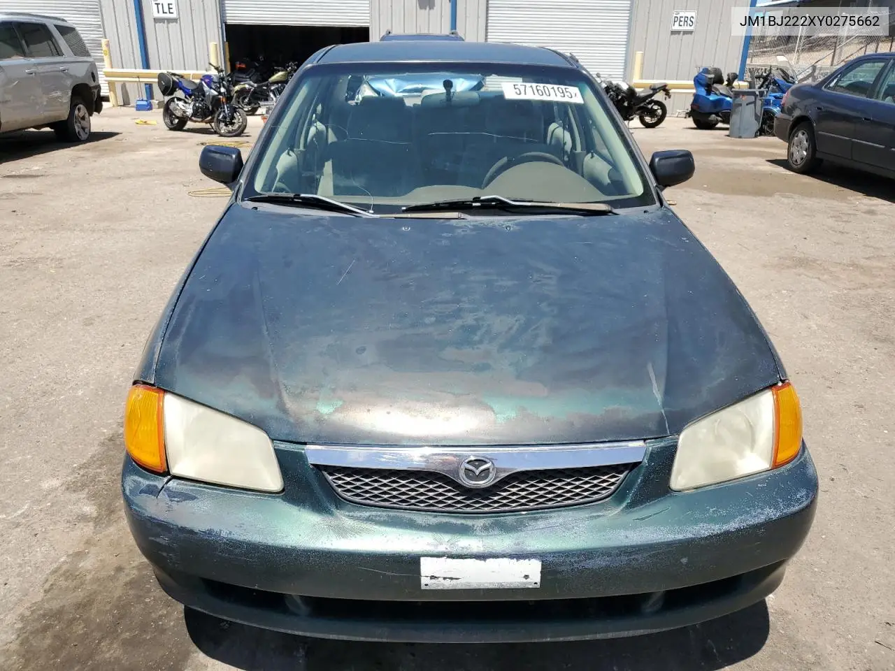 2000 Mazda Protege Dx VIN: JM1BJ222XY0275662 Lot: 57160195