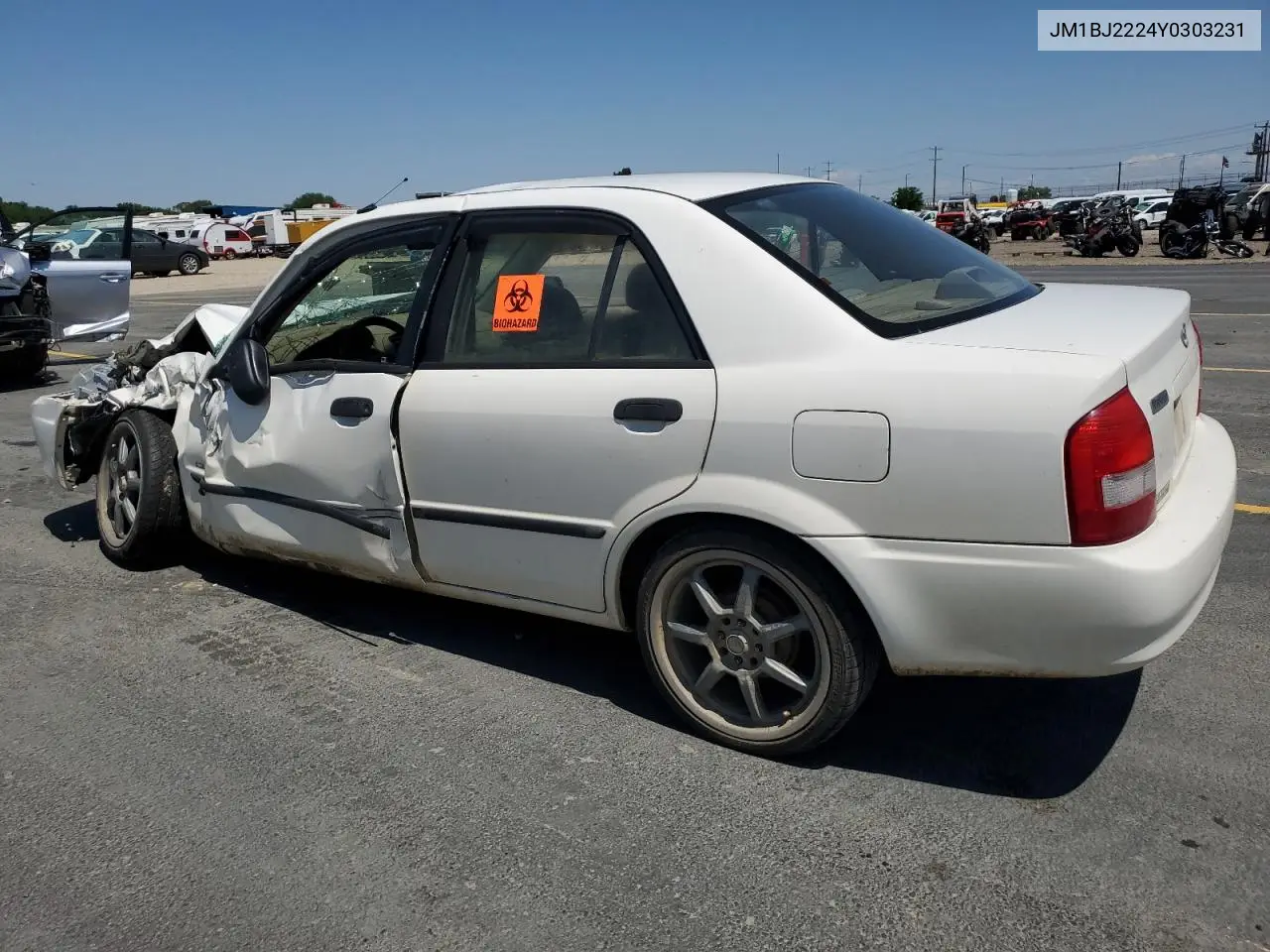 2000 Mazda Protege Dx VIN: JM1BJ2224Y0303231 Lot: 60853845