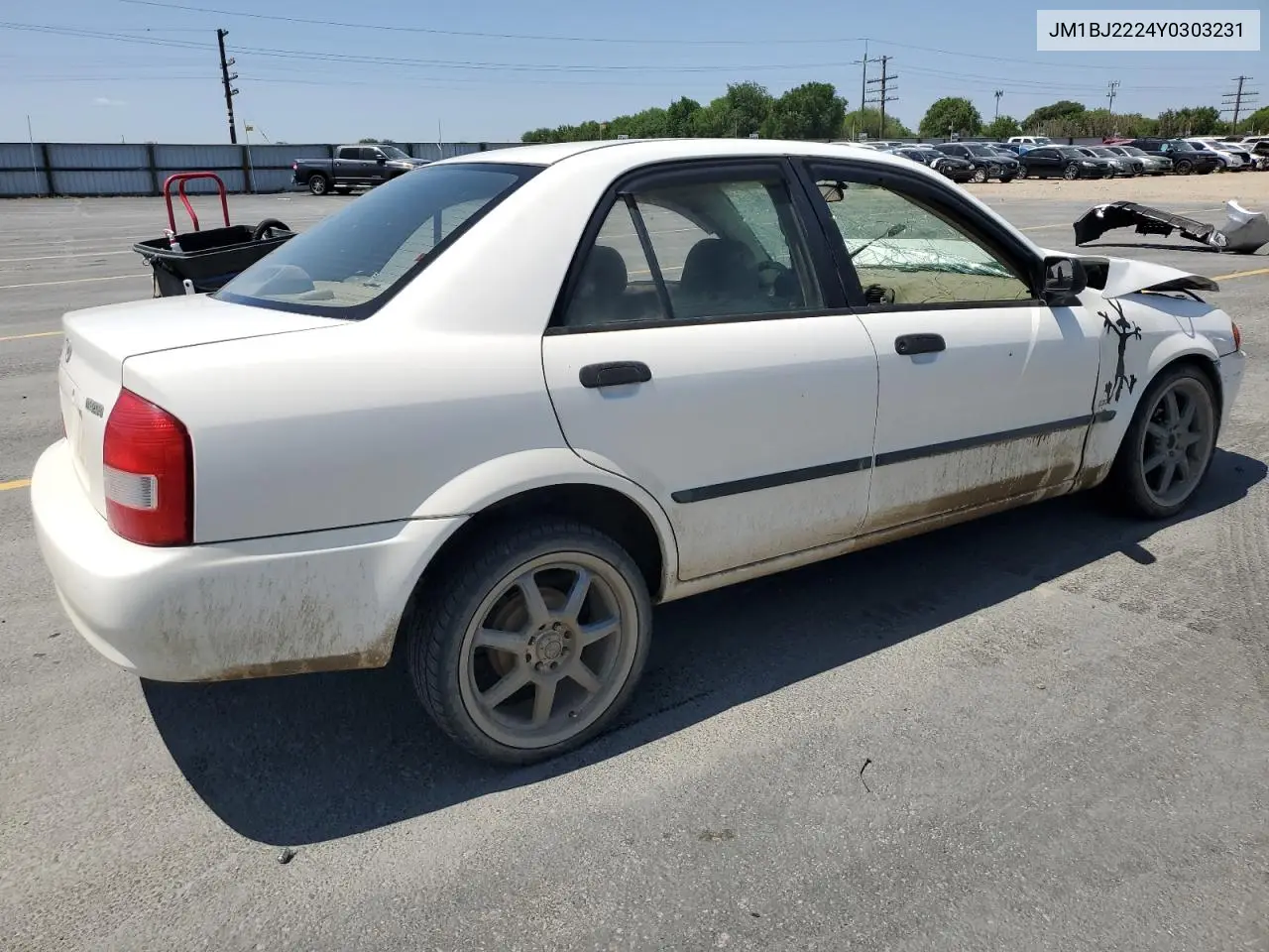 2000 Mazda Protege Dx VIN: JM1BJ2224Y0303231 Lot: 60853845