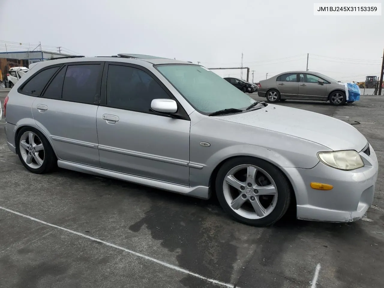 2003 Mazda Protege Pr5 VIN: JM1BJ245X31153359 Lot: 43657835