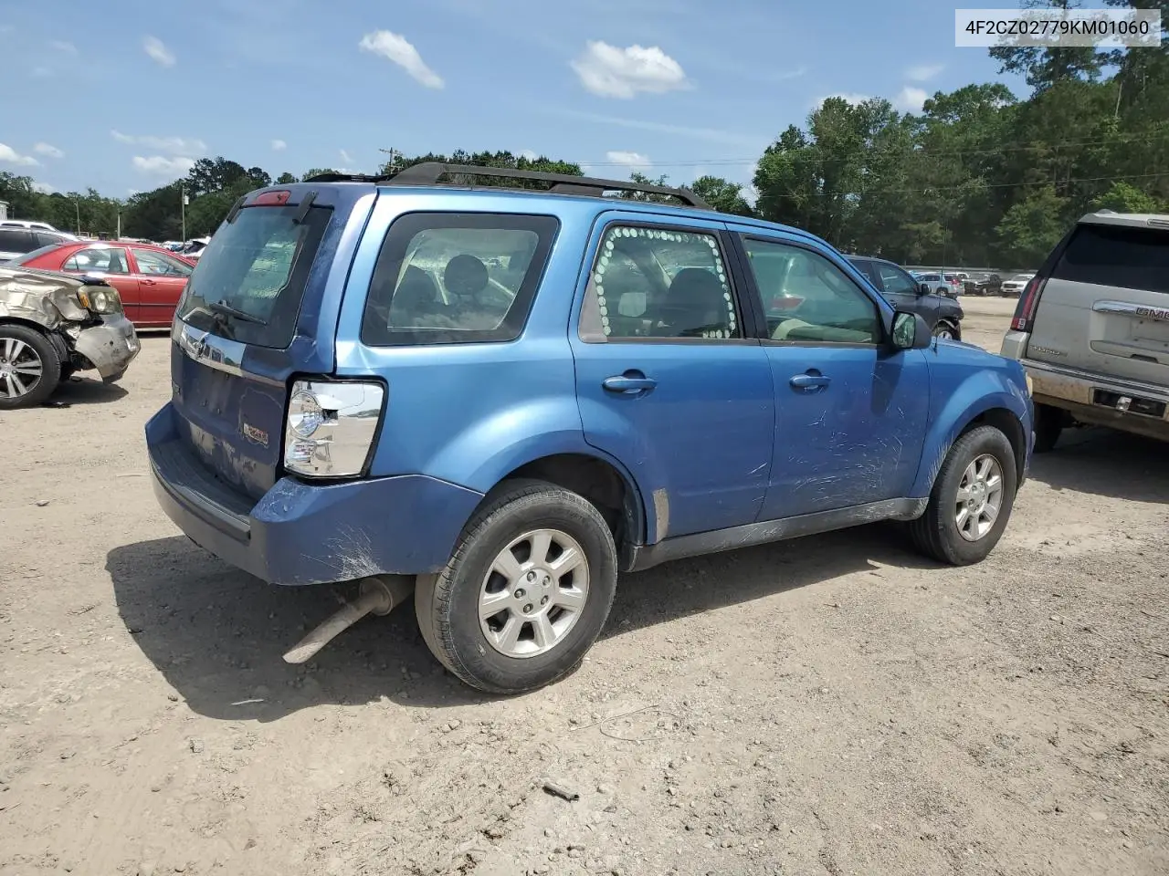 2009 Mazda Tribute I VIN: 4F2CZ02779KM01060 Lot: 57252965