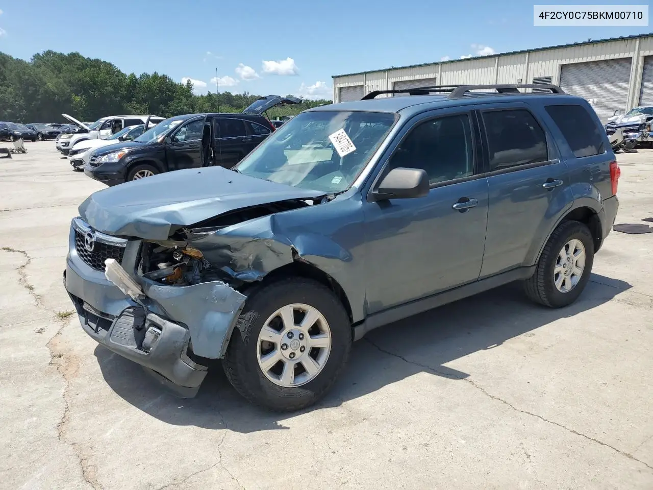 2011 Mazda Tribute I VIN: 4F2CY0C75BKM00710 Lot: 64847705