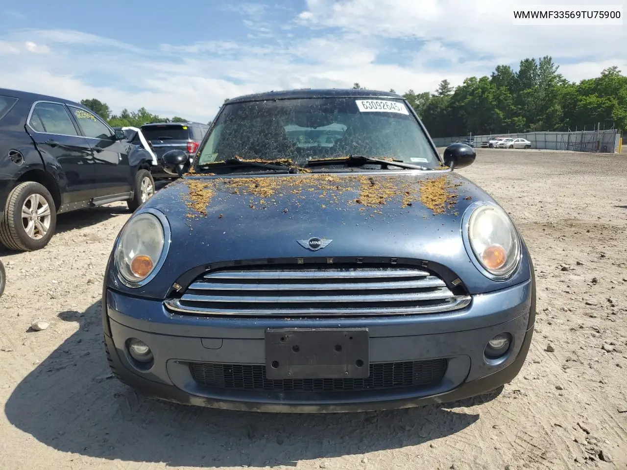 2009 Mini Cooper VIN: WMWMF33569TU75900 Lot: 63092645