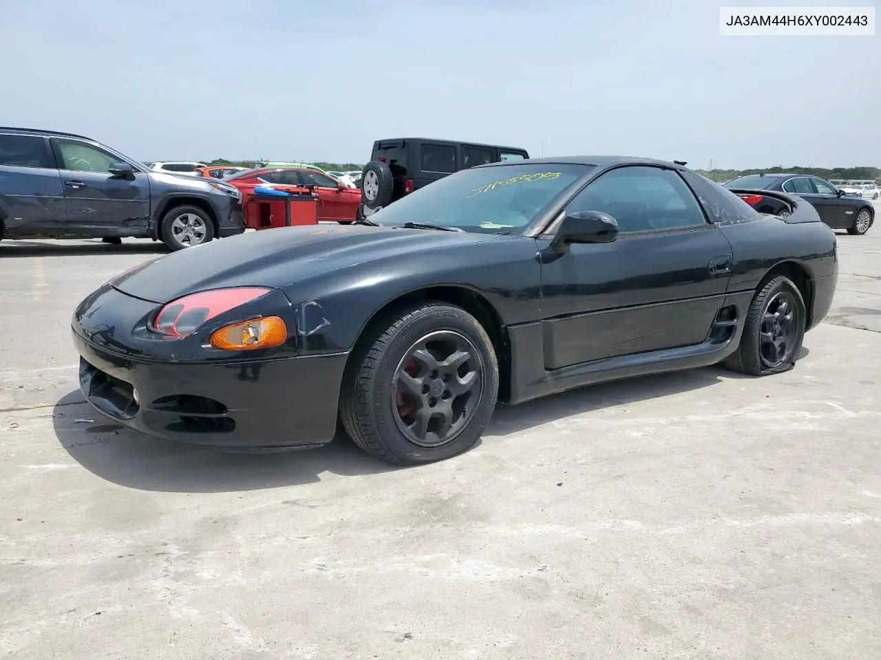 1999 Mitsubishi 3000 Gt VIN: JA3AM44H6XY002443 Lot: 57155505
