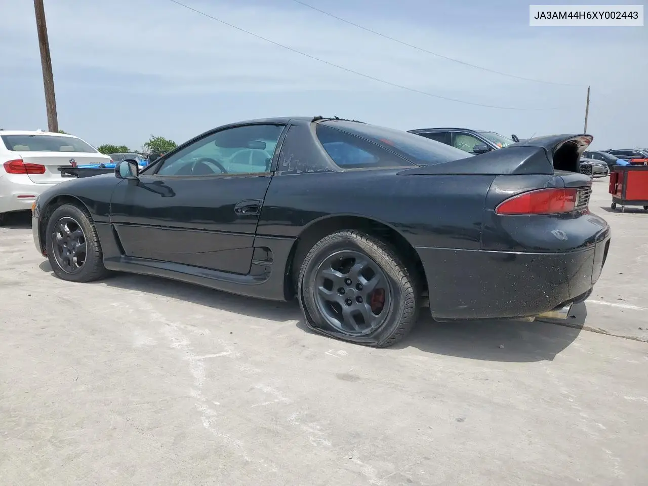 1999 Mitsubishi 3000 Gt VIN: JA3AM44H6XY002443 Lot: 57155505