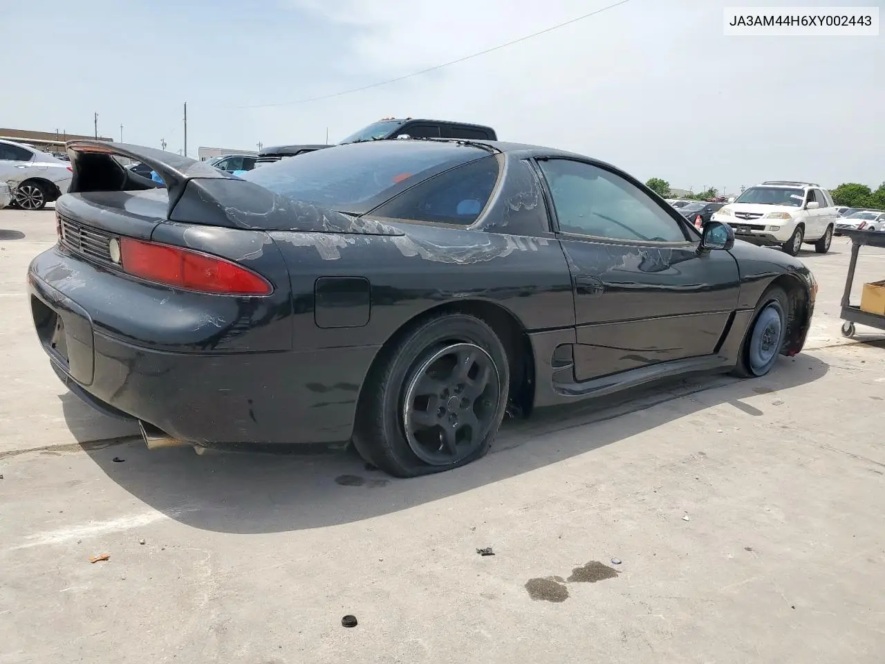 1999 Mitsubishi 3000 Gt VIN: JA3AM44H6XY002443 Lot: 57155505