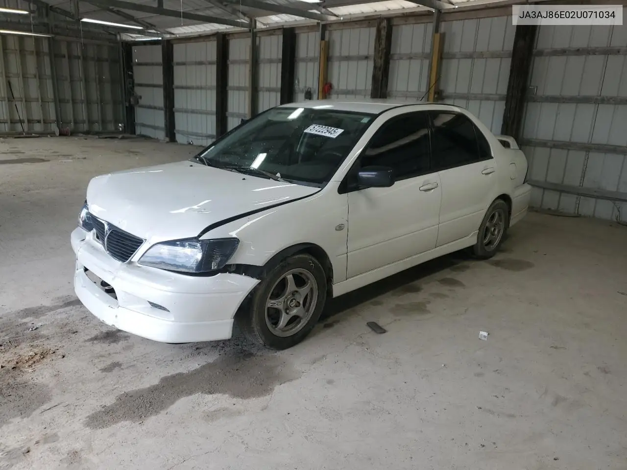 2002 Mitsubishi Lancer Oz Rally VIN: JA3AJ86E02U071034 Lot: 57222945