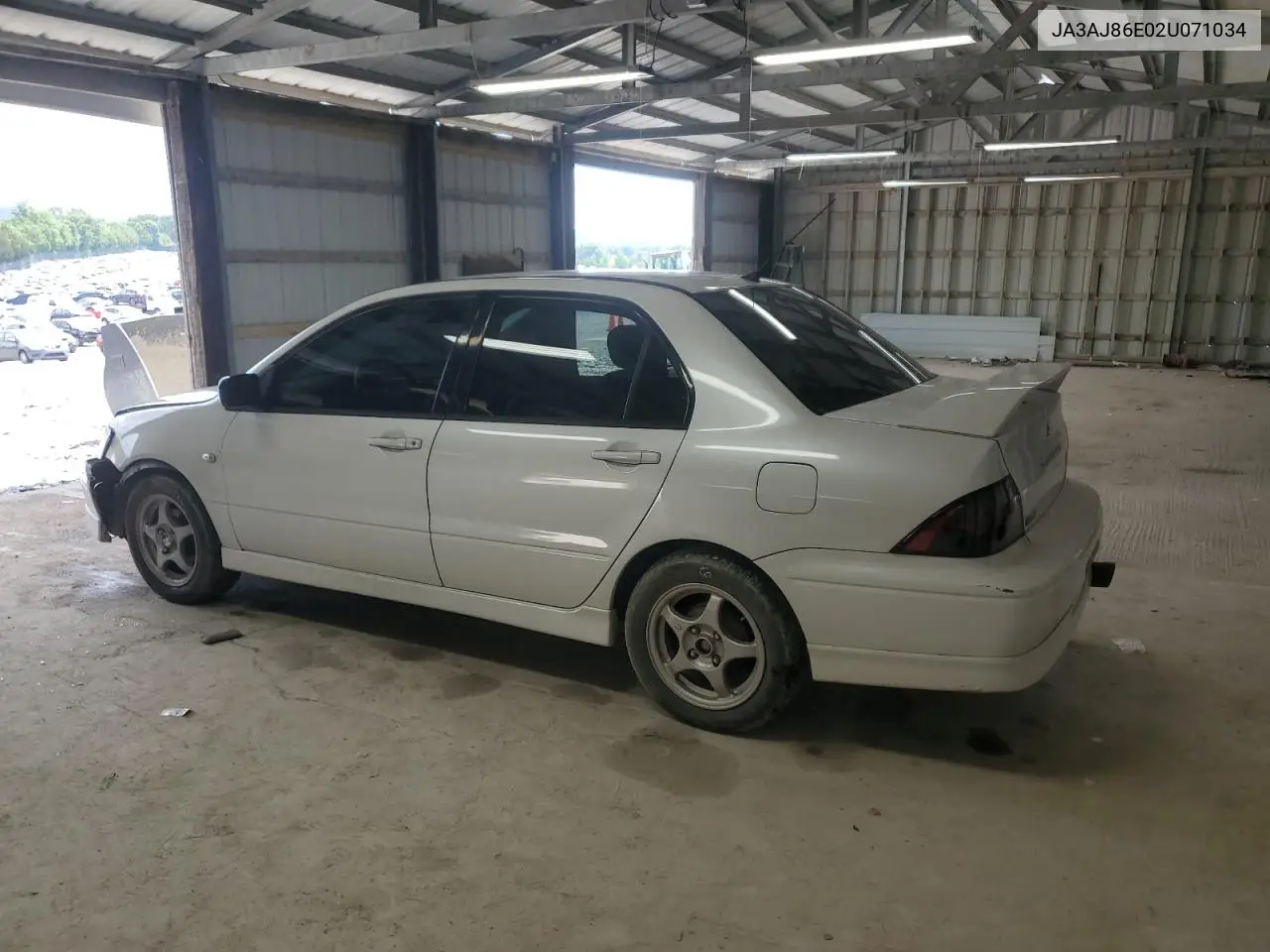 2002 Mitsubishi Lancer Oz Rally VIN: JA3AJ86E02U071034 Lot: 57222945
