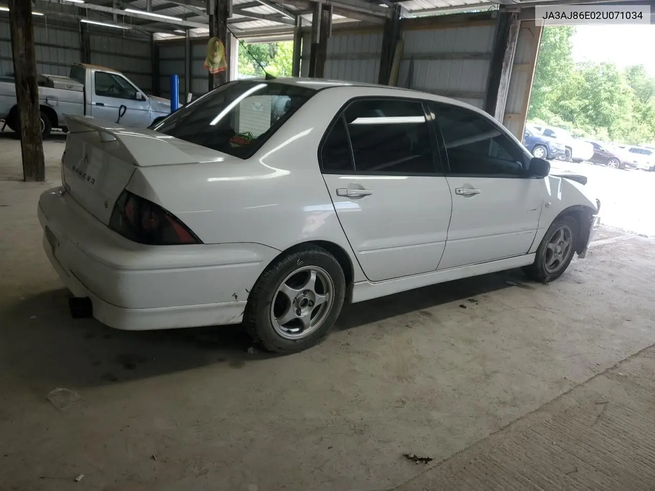 2002 Mitsubishi Lancer Oz Rally VIN: JA3AJ86E02U071034 Lot: 57222945