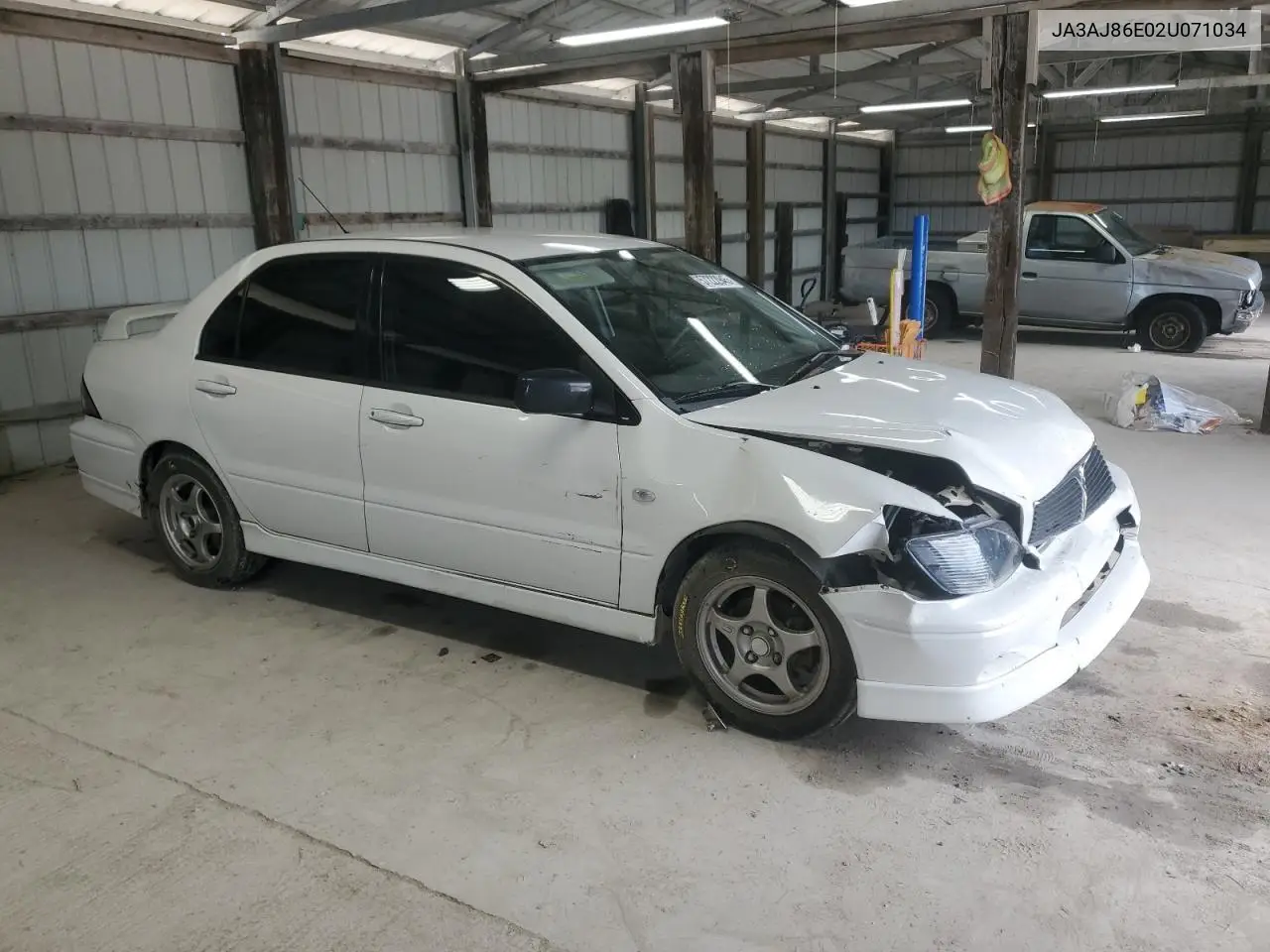 2002 Mitsubishi Lancer Oz Rally VIN: JA3AJ86E02U071034 Lot: 57222945