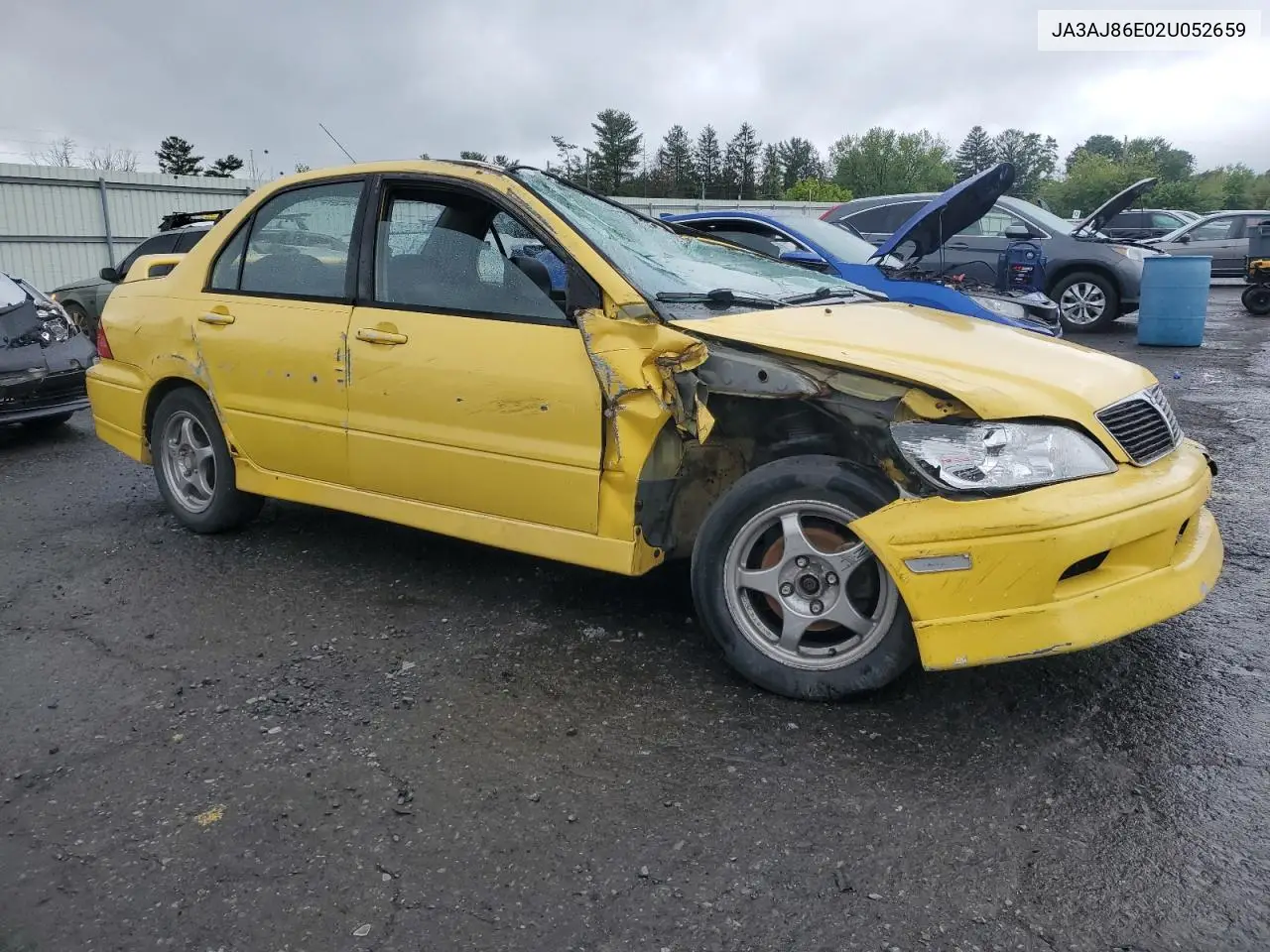 2002 Mitsubishi Lancer Oz Rally VIN: JA3AJ86E02U052659 Lot: 58044085
