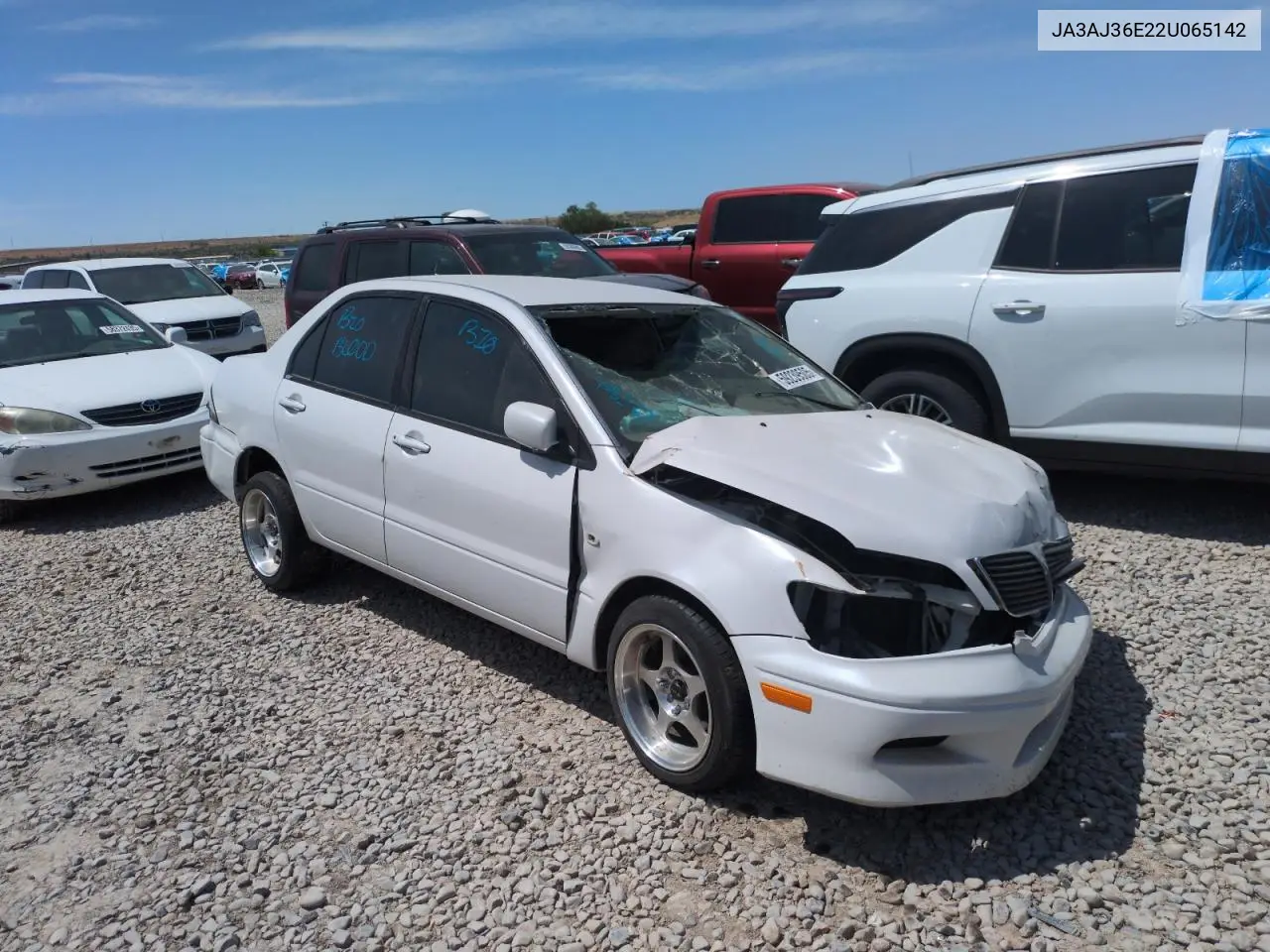 2002 Mitsubishi Lancer Ls VIN: JA3AJ36E22U065142 Lot: 59239505