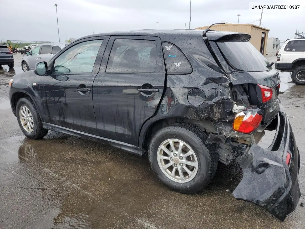 2011 Mitsubishi Outlander Sport Es VIN: JA4AP3AU7BZ010987 Lot: 55899085
