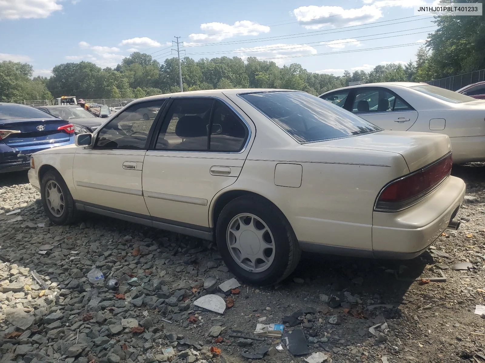 1990 Nissan Maxima VIN: JN1HJ01P8LT401233 Lot: 68678784