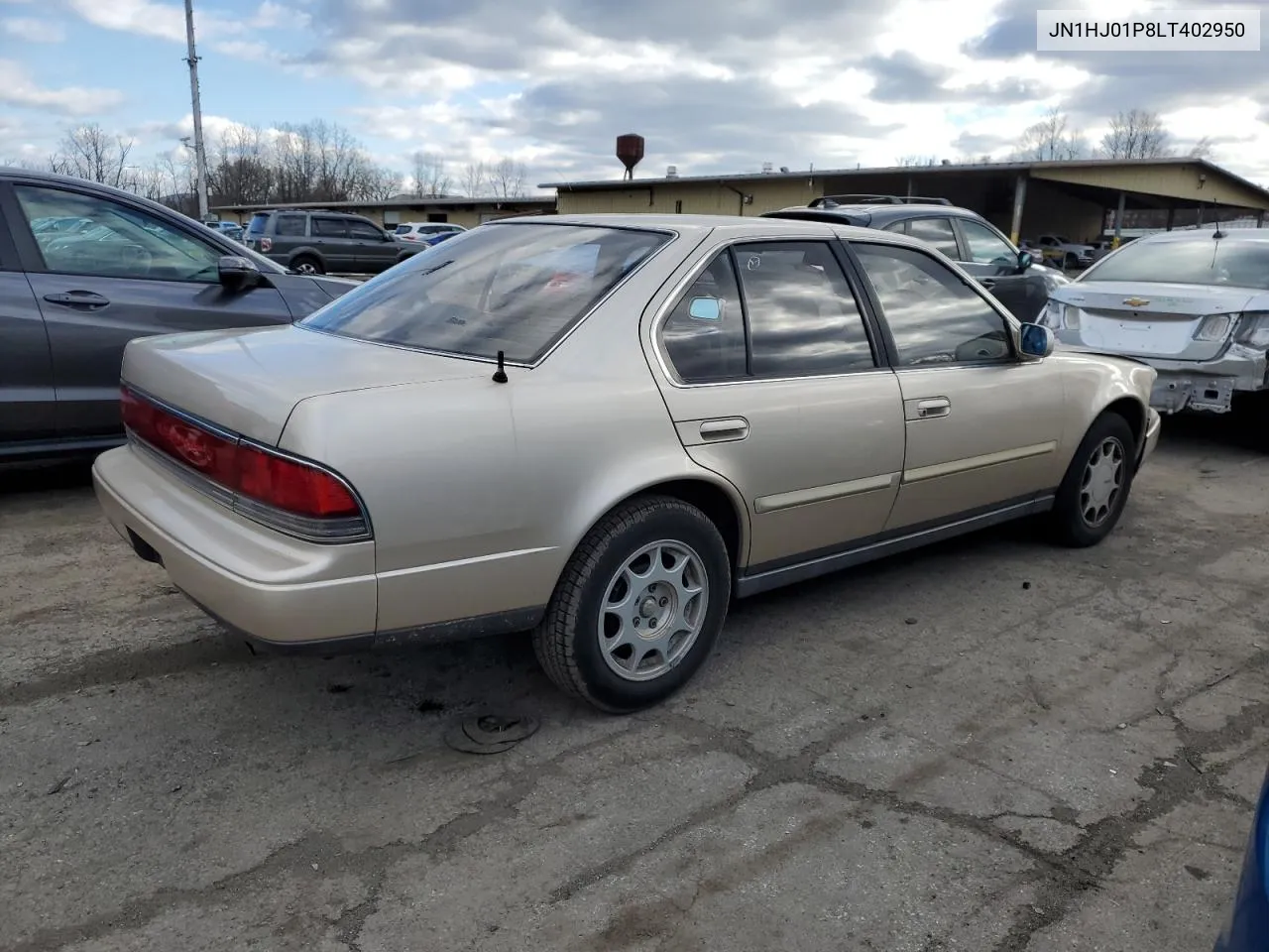 1990 Nissan Maxima VIN: JN1HJ01P8LT402950 Lot: 82714734