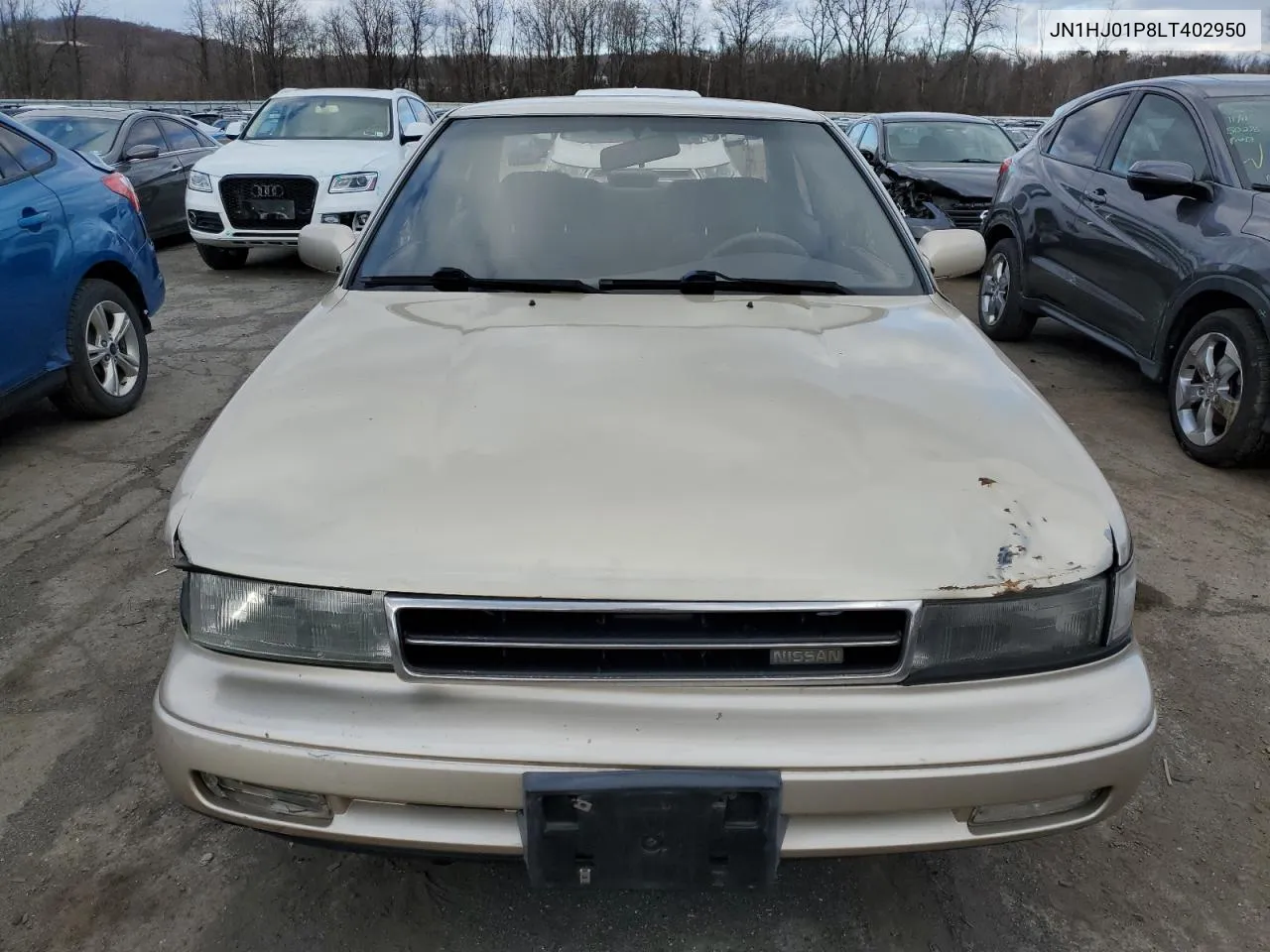 1990 Nissan Maxima VIN: JN1HJ01P8LT402950 Lot: 82714734