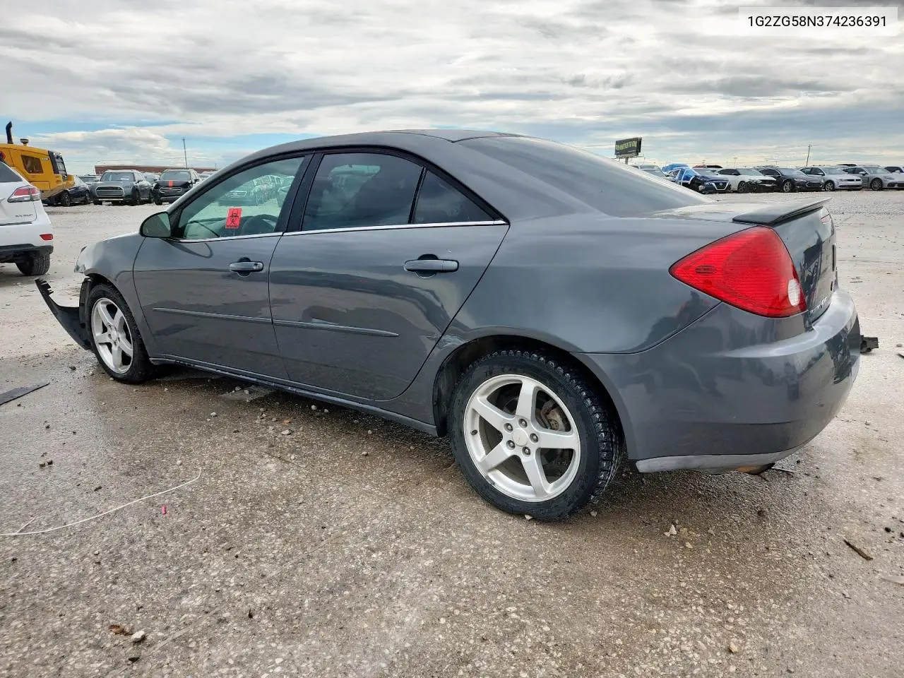 2007 Pontiac G6 Base VIN: 1G2ZG58N374236391 Lot: 60470595