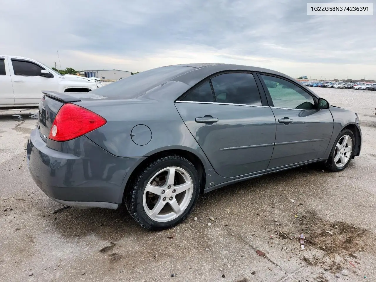 2007 Pontiac G6 Base VIN: 1G2ZG58N374236391 Lot: 60470595