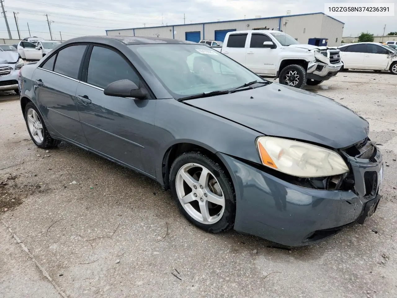 2007 Pontiac G6 Base VIN: 1G2ZG58N374236391 Lot: 60470595