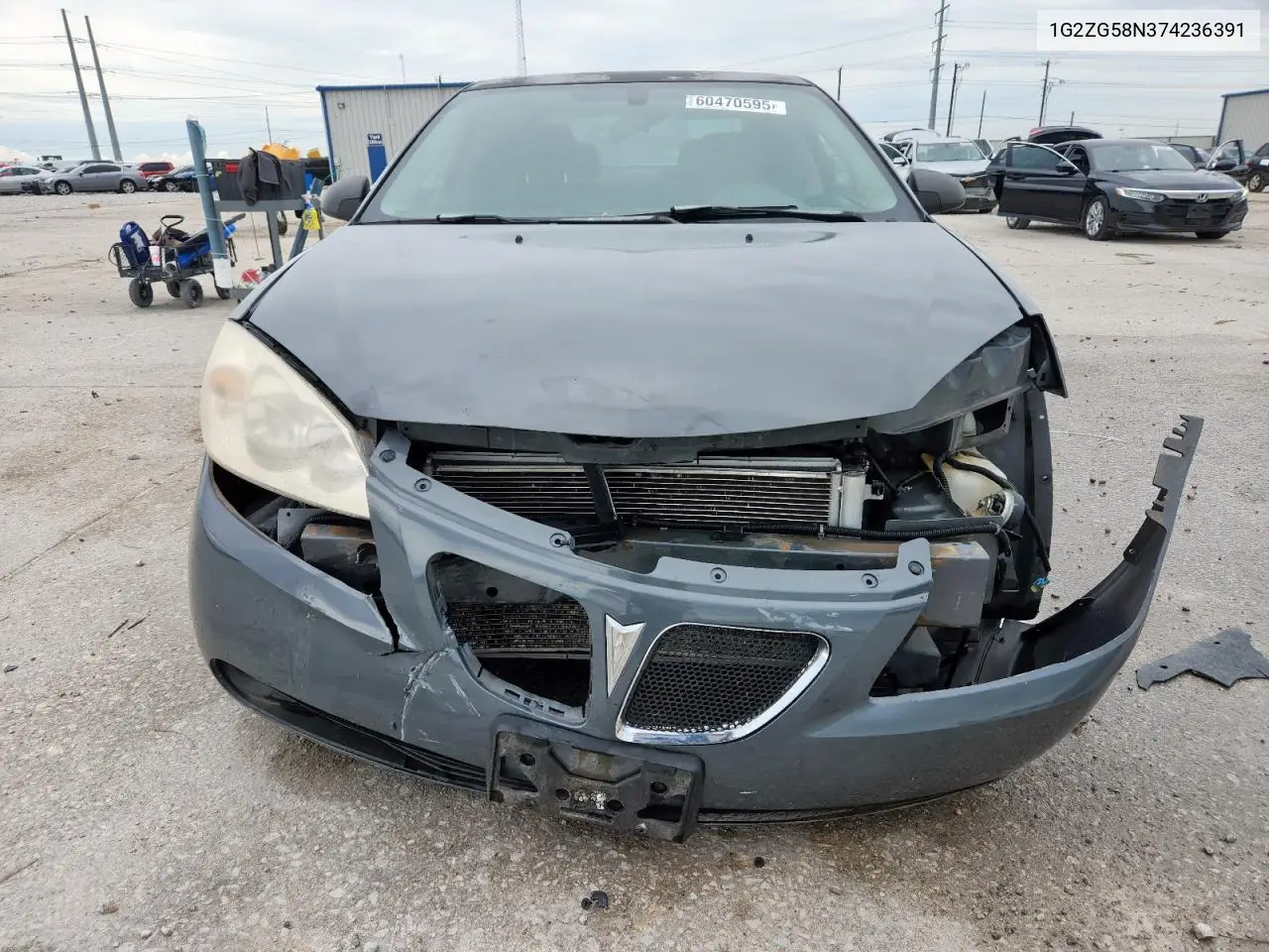 2007 Pontiac G6 Base VIN: 1G2ZG58N374236391 Lot: 60470595