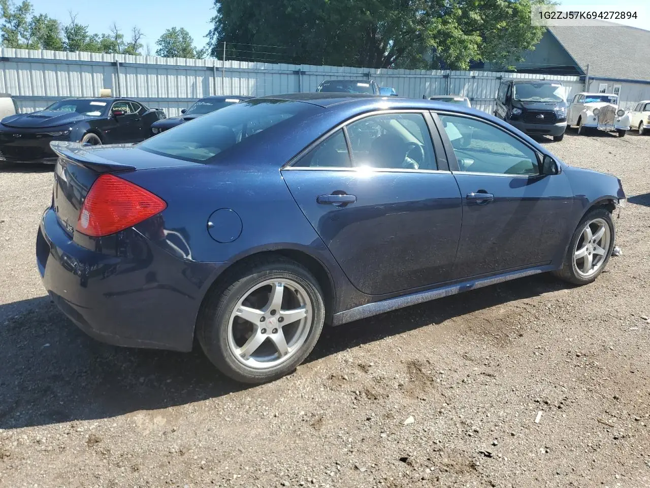 2009 Pontiac G6 VIN: 1G2ZJ57K694272894 Lot: 63006935