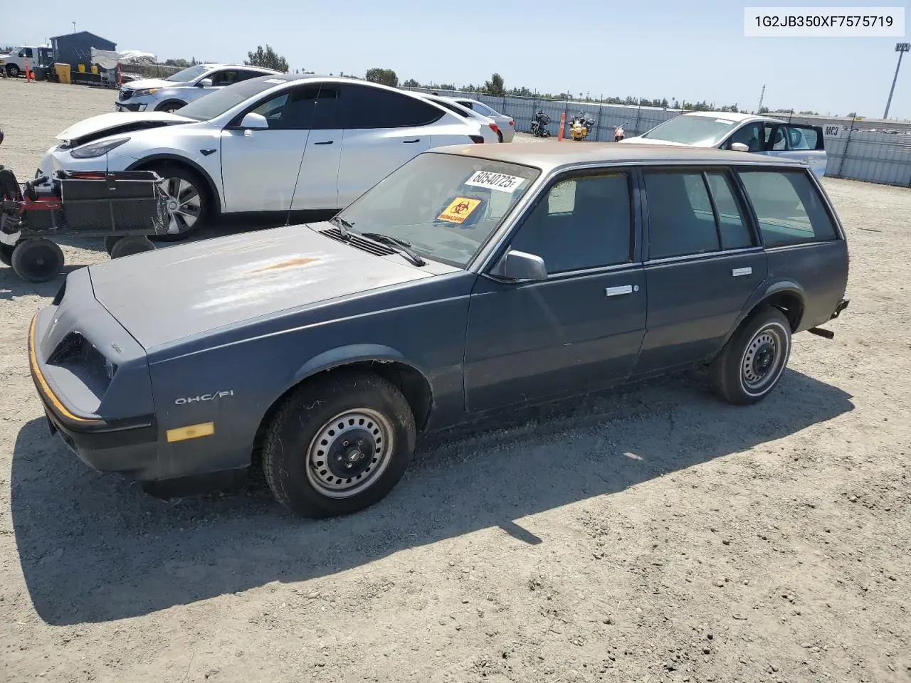 1985 Pontiac Sunbird VIN: 1G2JB350XF7575719 Lot: 60540725