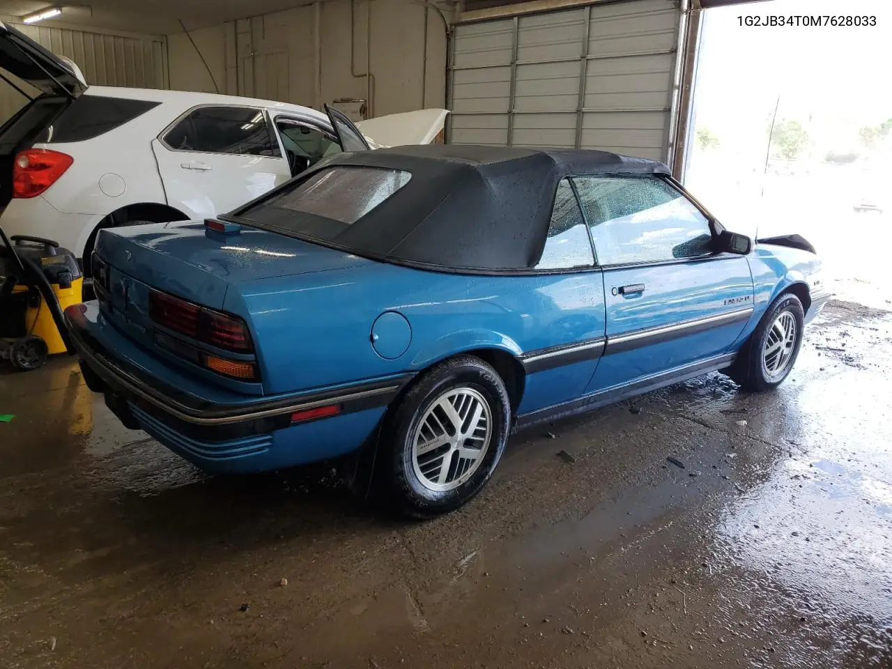 1991 Pontiac Sunbird Le VIN: 1G2JB34T0M7628033 Lot: 54523485