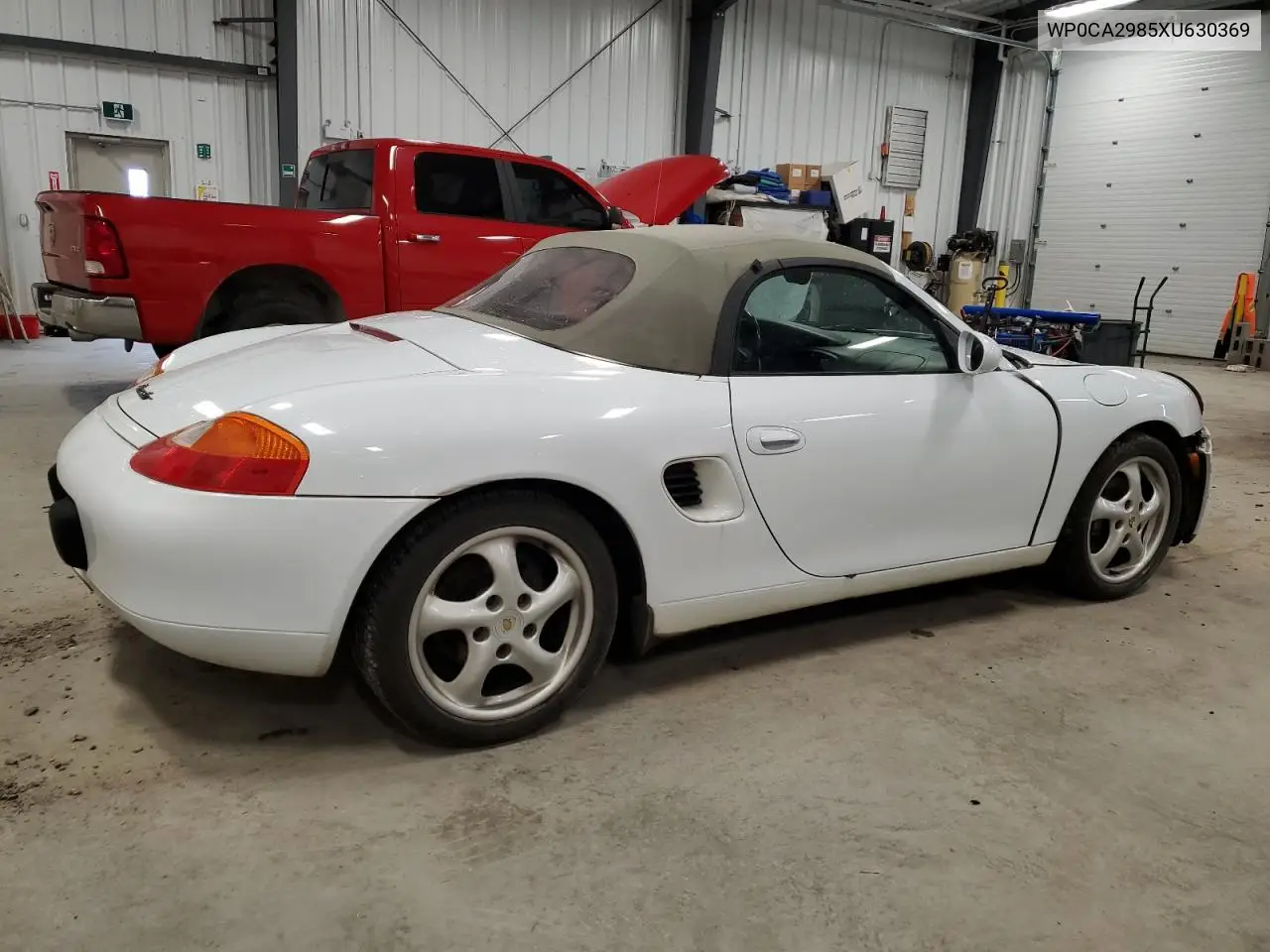 1999 Porsche Boxster VIN: WP0CA2985XU630369 Lot: 54736975
