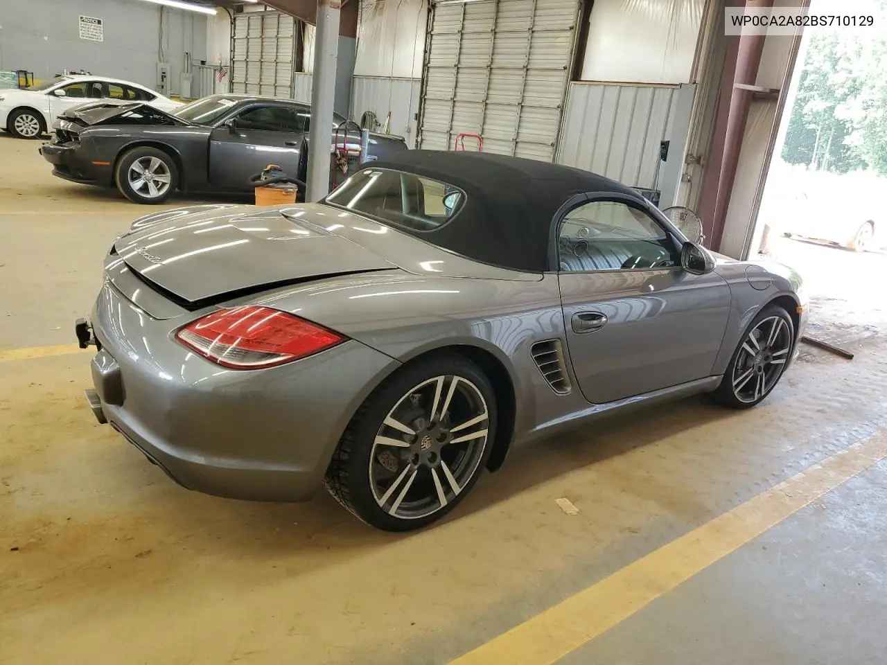 2011 Porsche Boxster VIN: WP0CA2A82BS710129 Lot: 61922085