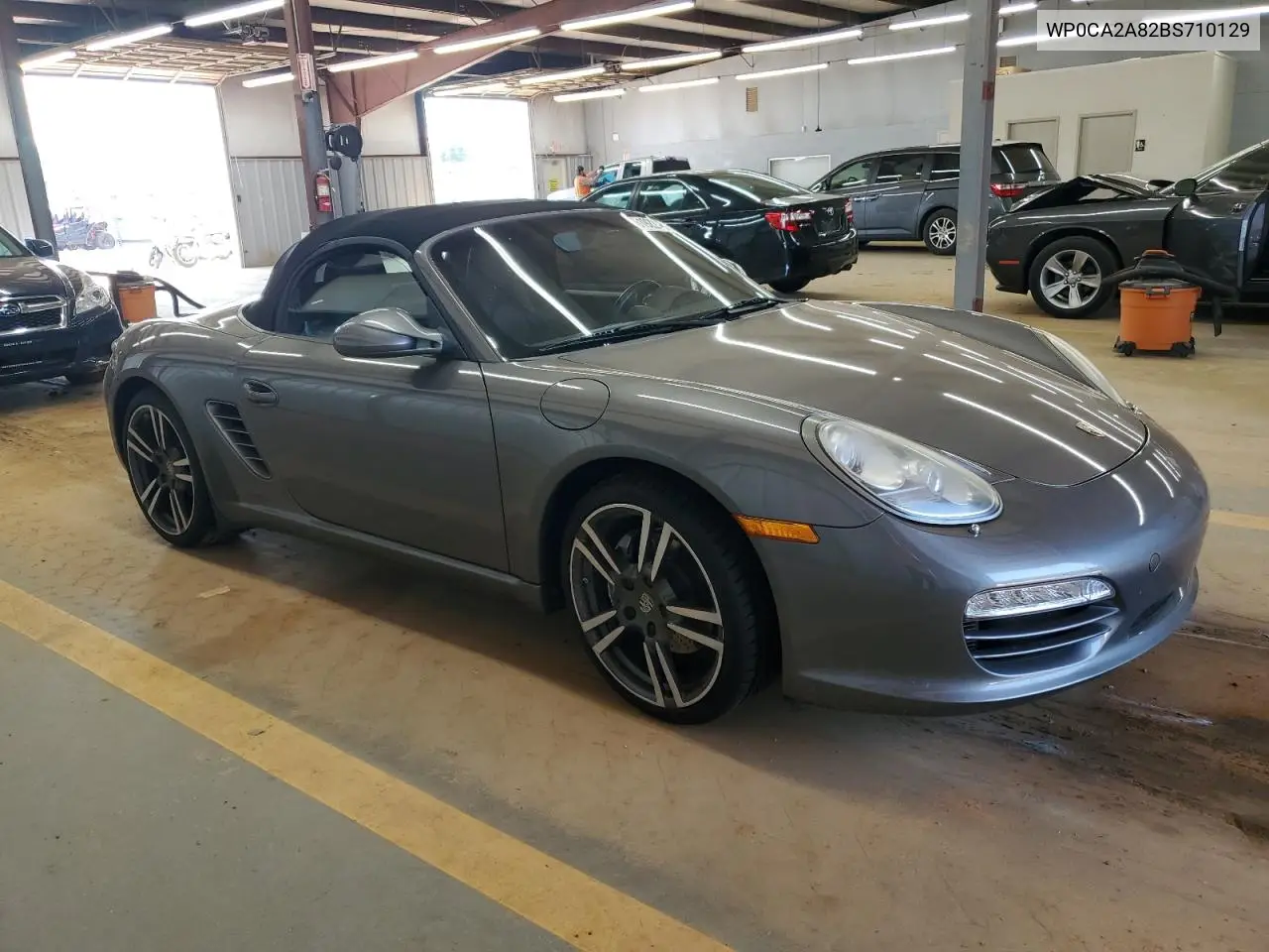 2011 Porsche Boxster VIN: WP0CA2A82BS710129 Lot: 61922085