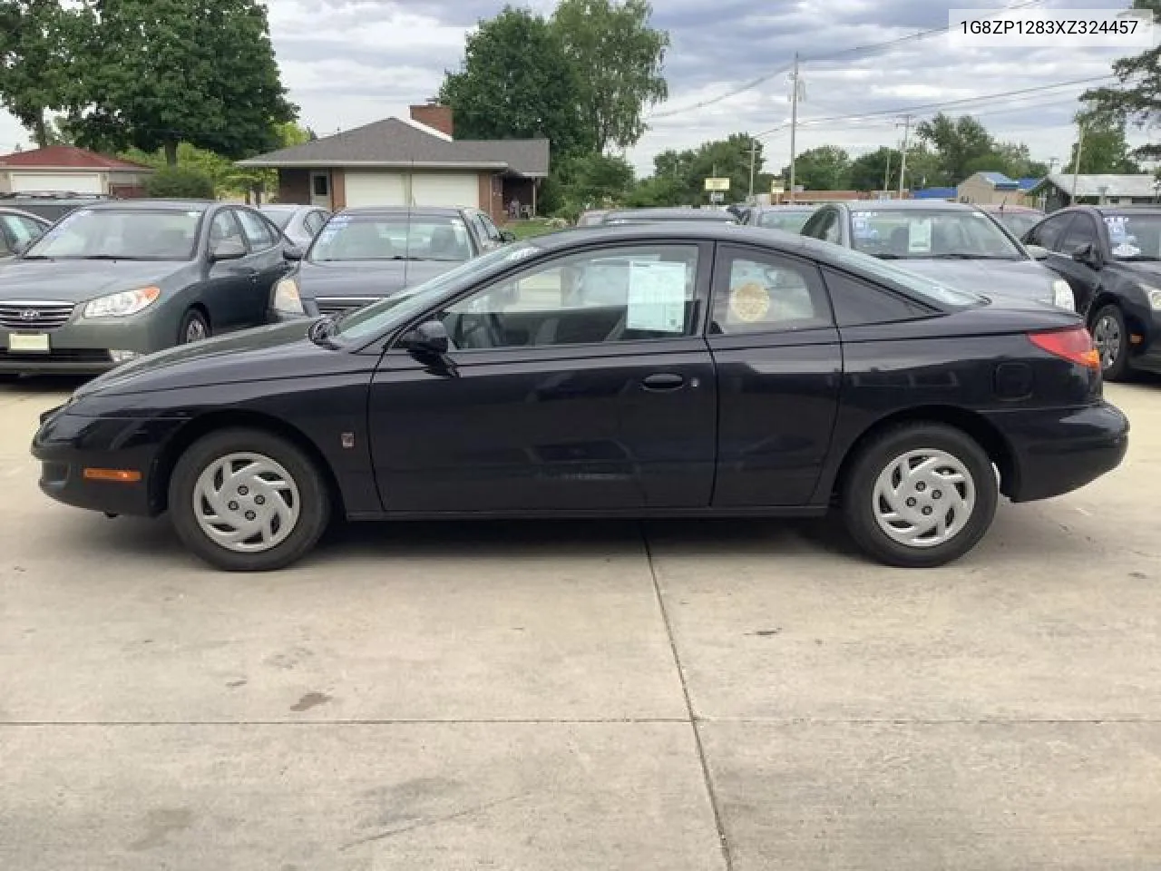 1999 Saturn Sc1 VIN: 1G8ZP1283XZ324457 Lot: 51760062