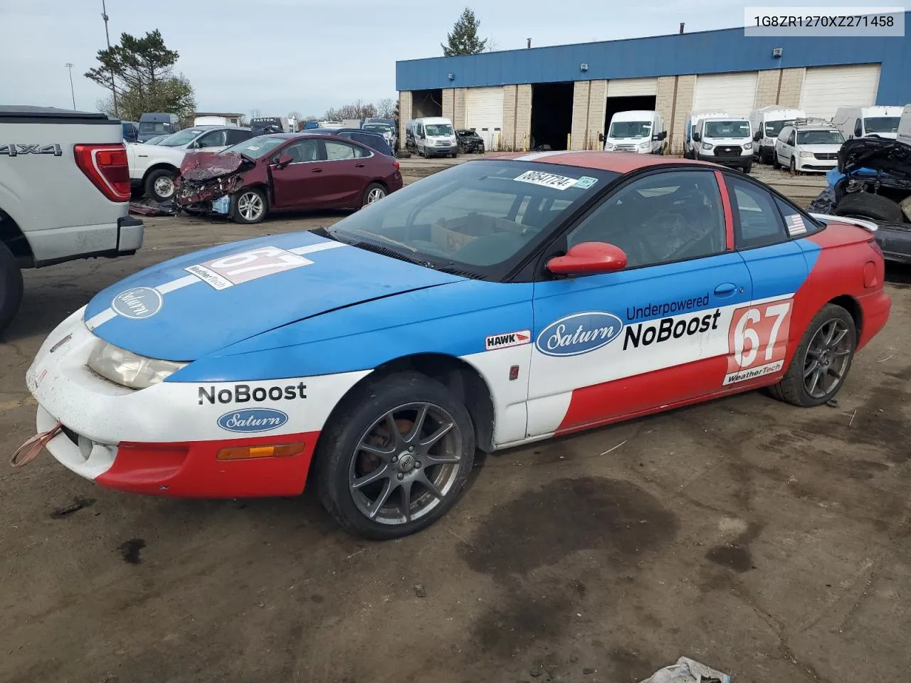 1999 Saturn Sc2 VIN: 1G8ZR1270XZ271458 Lot: 80547724