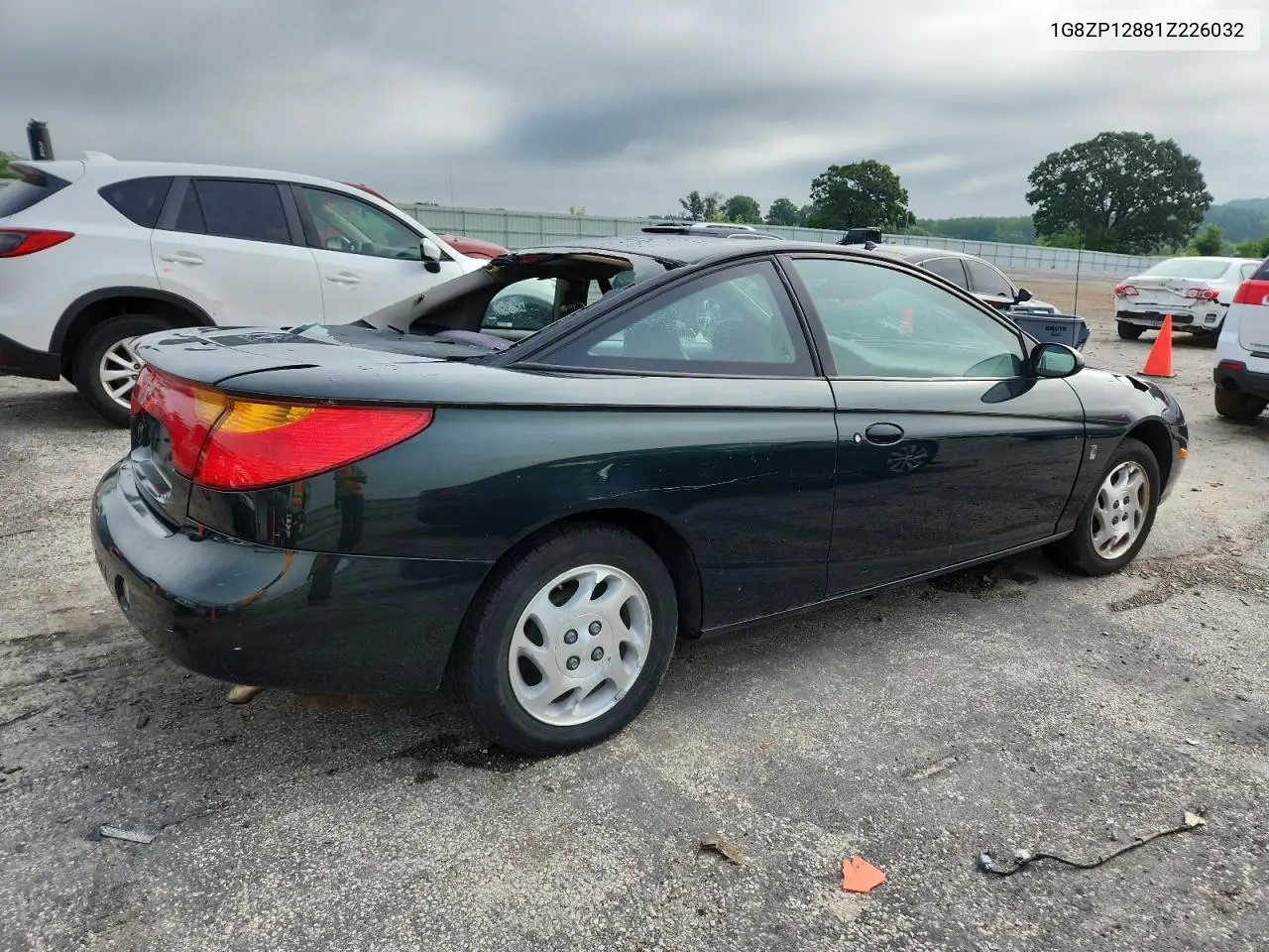 2001 Saturn Sc1 VIN: 1G8ZP12881Z226032 Lot: 62209055